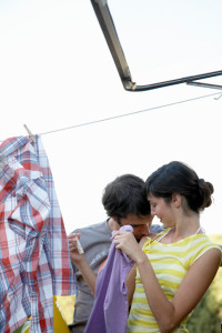 Romantic Couple Doing Laundry Outside