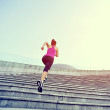Runner athlete running on stairs.
